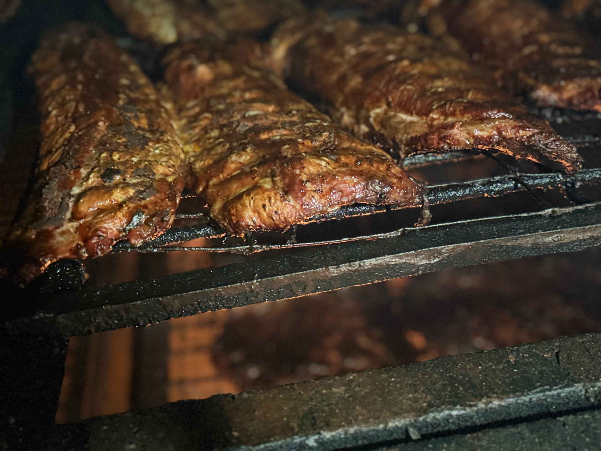 Ribs lined across the pit grate